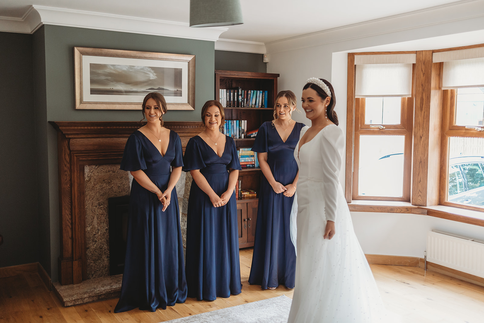Bride with her bridesmaids in living room